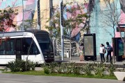 Light rail transit transiting on Mayor Luiz Paulo Conde Waterfront with the Ethnicities Wall in the background - Rio de Janeiro city - Rio de Janeiro state (RJ) - Brazil