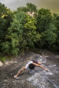 Man climbing rock in the middle of the forest  - Rio de Janeiro city - Rio de Janeiro state (RJ) - Brazil