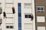 Workers doing maintenance on building facade - Porto Alegre city - Rio Grande do Sul state (RS) - Brazil