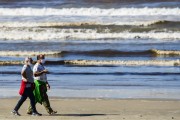 People walking on Xangri-la Beach - Xangri-la city - Rio Grande do Sul state (RS) - Brazil