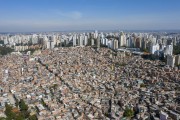 Picture taken with drone of the Paraisopolis Slum with luxury buildings in the surroundings - Sao Paulo city - Sao Paulo state (SP) - Brazil