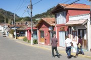 Tourists strolling on Coronel Joao Vieira Street with stores closed due to the Coronavirus Crisis - Goncalves city - Minas Gerais state (MG) - Brazil