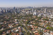 Picture taken with drone of houses and Afranio Peixoto Avenue - Jockey Club of Sao Paulo in the background - Sao Paulo city - Sao Paulo state (SP) - Brazil