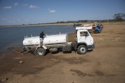 Water trucks being loaded with water in the Barreiro Reservoir of transposes the Sao Francisco River to supply communities in rural areas - Sertania city - Pernambuco state (PE) - Brazil