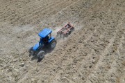 Picture taken with drone of the tractor plowing the land for planting - Truka Indigenous Land - Assunçao Island - Cabrobo city - Pernambuco state (PE) - Brazil