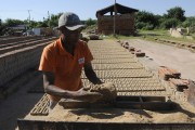 Man manually producing bricks in pottery - Jose Bonifacio city - Sao Paulo state (SP) - Brazil