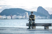 Statue of the poet Carlos Drummond de Andrade with protective mask against Covid 19 - Rio de Janeiro city - Rio de Janeiro state (RJ) - Brazil