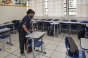 Worker cleaning the high school classroom in order to prevent the coronavirus pandemic - Sao Paulo city - Sao Paulo state (SP) - Brazil