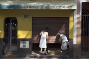 Merchants opening shop at Deputado Cunha Bueno Square - Monteiro Lobato city - Sao Paulo state (SP) - Brazil