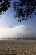 Sugarloaf Mountain shrouded in clouds seen from Botafogo Beach - Rio de Janeiro city - Rio de Janeiro state (RJ) - Brazil