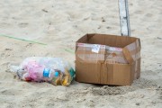 Cardboard and plastic trash on the sand of Copacabana Beach - Rio de Janeiro city - Rio de Janeiro state (RJ) - Brazil