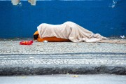 Homeless person sleeping on the floor on the sidewalk of Barata Ribeiro Street - Rio de Janeiro city - Rio de Janeiro state (RJ) - Brazil