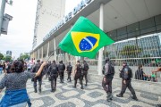 Protester holding Brazil flag - Demonstration in opposition to the government of President Jair Messias Bolsonaro - Rio de Janeiro city - Rio de Janeiro state (RJ) - Brazil