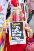 Protester holding a sign that reads (Stop killing us and killing our children) - Demonstration in opposition to the government of President Jair Messias Bolsonaro - Rio de Janeiro city - Rio de Janeiro state (RJ) - Brazil