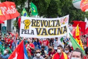 Protesters holding a sign that reads (Revolt for the vaccine) - Demonstration in opposition to the government of President Jair Messias Bolsonaro - Rio de Janeiro city - Rio de Janeiro state (RJ) - Brazil
