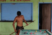man playing pool in bar - Careiro city - Amazonas state (AM) - Brazil