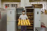 Baker producing bread - Bakery - Guarani city - Minas Gerais state (MG) - Brazil