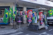 Street vendor stall selling Lula and Bolsonaro posters on the sidewalk of Santa Rita Street - Juiz de Fora city - Minas Gerais state (MG) - Brazil