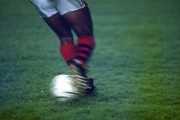 Detail of a player from Clube de Regatas do Flamengo with the ball in a soccer match - The 80s - Rio de Janeiro city - Rio de Janeiro state (RJ) - Brazil