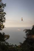 Practitioner of slackline on the top of the Two Brothers Mountain with ocean in the background - Rio de Janeiro city - Rio de Janeiro state (RJ) - Brazil