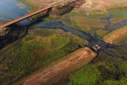 Picture taken with drone of old dirt road and the old bridge that reappeared after 40 years submerged in the Ribeirao Padua Diniz, which is an arm of the water reservoir of the Agua Vermelha hydroelectric plant - Indiapora city - Sao Paulo state (SP) - Brazil