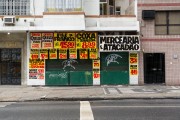 Promotional posters for grocery products on Nossa Senhora de Copacabana Avenue - Rio de Janeiro city - Rio de Janeiro state (RJ) - Brazil