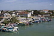 Fishing boats moored at the pier on the Itapemirim River with Trapiche and Palacio das Aguias in the background - Marataizes city - Espirito Santo state (ES) - Brazil