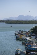 Fishing boats moored at the pier on the Itapemirim River - Marataizes city - Espirito Santo state (ES) - Brazil
