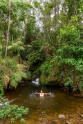 Woman bathing in the river near the village of Salinas - Tres Picos State Park - Teresopolis-Friburgo - Nova Friburgo city - Rio de Janeiro state (RJ) - Brazil