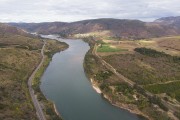Picture taken with drone of the Doce River bordered by the BR-259 highway and by the Vitoria-Minas Gerais railroad - Baixo Guandu city - Espirito Santo state (ES) - Brazil
