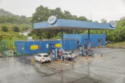 Vehicles being fueled by vehicular natural gas (CNG) at a gas station in Barbacena - Barbacena city - Minas Gerais state (MG) - Brazil