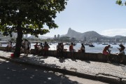 People socializing and drinking sitting by the sea in Short wall of Urca  - Rio de Janeiro city - Rio de Janeiro state (RJ) - Brazil