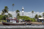 Fishing boats on the Preguiças River with Preguiças Lighthouse in the background - Barreirinhas city - Maranhao state (MA) - Brazil