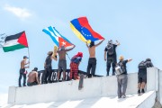 Protesters with the flags of Palestine, Cuba and Venezuela - Demonstration in repudiation of the murder of Congolese refugee Moise Kabagambe near Post 8 - Rio de Janeiro city - Rio de Janeiro state (RJ) - Brazil