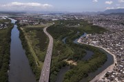 Picture taken with drone of the Presidente Joao Goulart Expressway (RJ-071), also known as the Red Line, crossing the Pavuna River - Rio de Janeiro city - Rio de Janeiro state (RJ) - Brazil