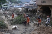 Firefighters searching for bodies with the help of dogs after landslides and flooding caused by heavy rains - Petropolis city - Rio de Janeiro state (RJ) - Brazil