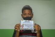 Boy shows certificate of vaccination against Covid-19 at a SUS health center - Guarani city - Minas Gerais state (MG) - Brazil