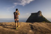 Man on the summit of Pedra Bonita (Bonita Stone) with the Rock of Gavea in the background  - Rio de Janeiro city - Rio de Janeiro state (RJ) - Brazil