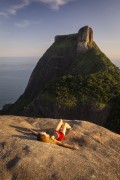 Woman on the summit of Pedra Bonita (Bonita Stone) with the Rock of Gavea in the background  - Rio de Janeiro city - Rio de Janeiro state (RJ) - Brazil