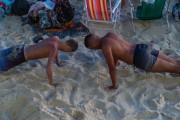 Men doing push-ups at Arpoador beach - Rio de Janeiro city - Rio de Janeiro state (RJ) - Brazil