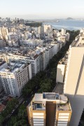 View of tree-lined street and residential buildings - Rio de Janeiro city - Rio de Janeiro state (RJ) - Brazil
