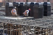 Civil construction workers assembling slab base on shoring - shape type plastic buckets for slabs - Sao Paulo city - Sao Paulo state (SP) - Brazil
