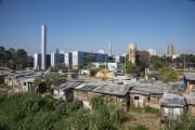 Remaining slum of the urbanization and construction by Cohab of Parque do Gato - Parque do Gato housing complex in the background - Sao Paulo city - Sao Paulo state (SP) - Brazil