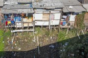 Remaining shacks from the urbanization of the Gato Slum dumping sewage into the Tamanduateí River - Sao Paulo city - Sao Paulo state (SP) - Brazil