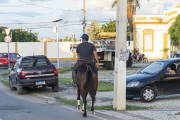 Man riding a horse on a street in the urban area of the city - Cajazeiras city - Paraiba state (PB) - Brazil