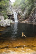 Tourist in natural pool in Anjos e Arcanjos Waterfall - Chapada dos Veadeiros National Park  - Alto Paraiso de Goias city - Goias state (GO) - Brazil