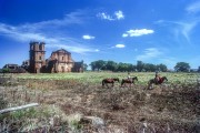 gauchos on horseback with Ruins of the Saint Michael Church - Archaeological Site of Saint Michael the Archangel (1745) in the background - Sao Miguel das Missoes city - Rio Grande do Sul state (RS) - Brazil