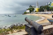 Cannon of Santa Maria Fort (1696) with Port of Barra Beach and the Sao Diogo Fort (1722) in the background  - Salvador city - Bahia state (BA) - Brazil