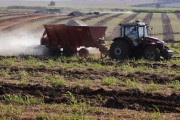 Tractor making fertilizing soil for planting sugarcane - Pereira Barreto city - Sao Paulo state (SP) - Brazil
