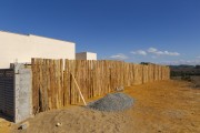 Residential wall made from bark of cut eucalyptus logs - Guarani city - Minas Gerais state (MG) - Brazil